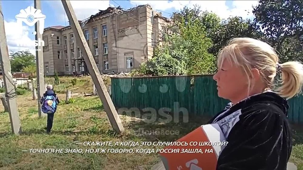 Выбитые окна, стены-решето и полумрак — это школа в Попаснянском районе