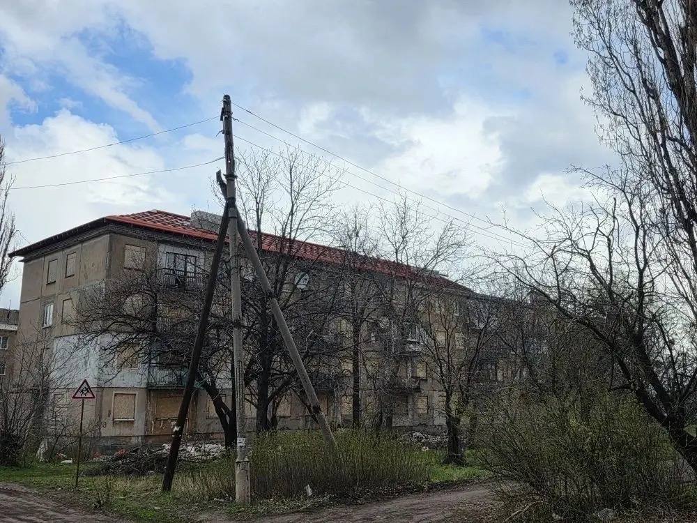 В городе Золотое начался ремонт многоквартирного дома