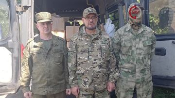 Военные следователи СК России доставили гуманитарную помощь казачьей бригаде «Сибирь» в ЛНР